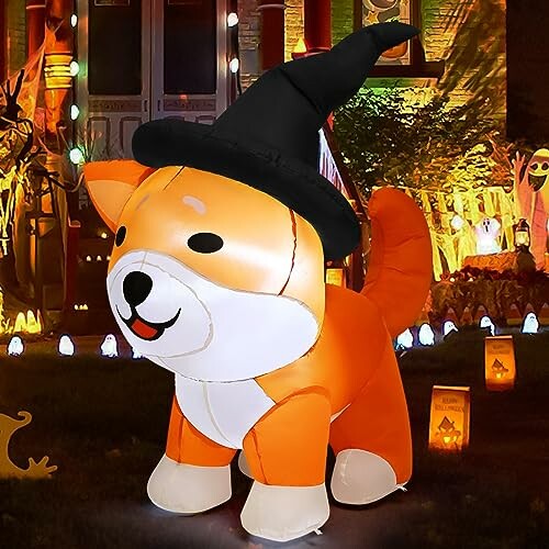 Inflatable dog with witch hat in Halloween decor.