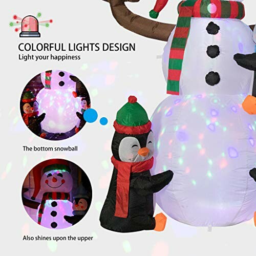 Inflatable Christmas decoration with a penguin and snowman featuring colorful lights.