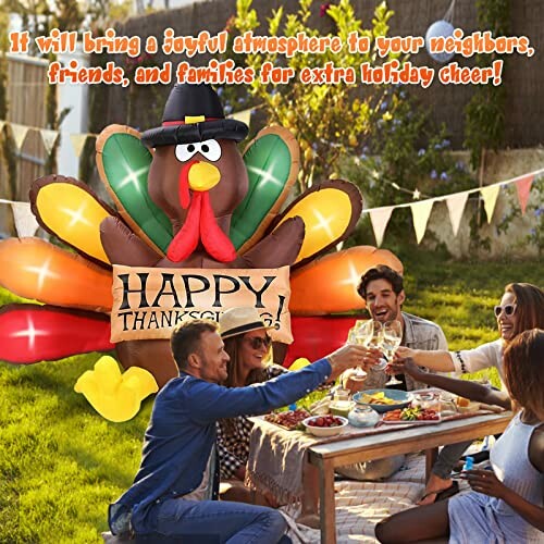 People enjoying a Thanksgiving picnic with inflatable turkey decoration.