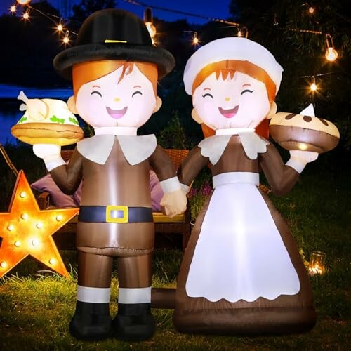 Inflatable Thanksgiving pilgrim figures holding pies.