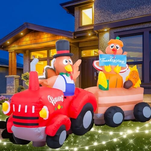 Inflatable Thanksgiving turkey on a red tractor with a 'Happy Thanksgiving' sign.